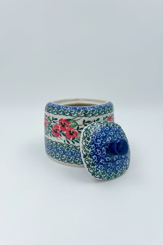 Polish pottery 9oz” square foral sugar bowl in Red Pansy Pattern.
Ceramika Artystyczna Company