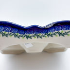 UNIKAT Whispering Ferns divided platter, exterior side view showing scalloped feet and rose border