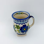 Blue Poppy tulip mug on white background, angled front view