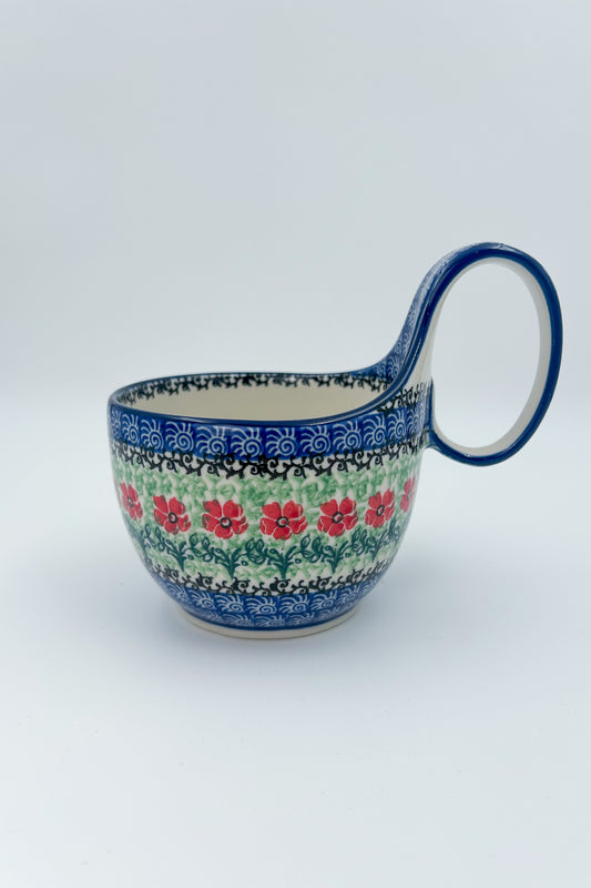 Polish pottery 16oz bowl with loop handle in the UNIKAT Candy Red Poppy pattern. It holds 16 oz of fluid.
Ceramika Artystyczna Company