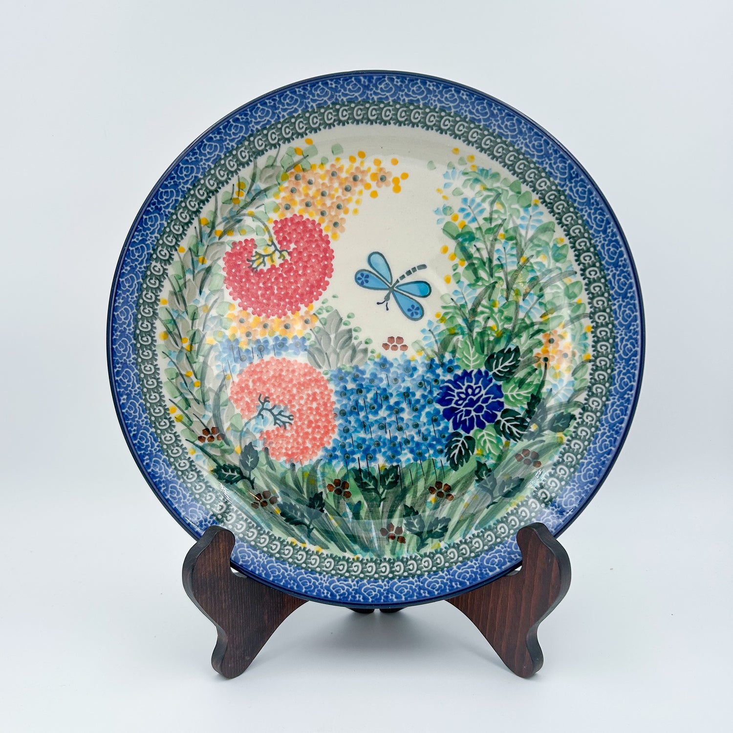 Decorative polish pottery plate with floral and butterfly.  Ceramika Artystyczna Garden Delight pattern