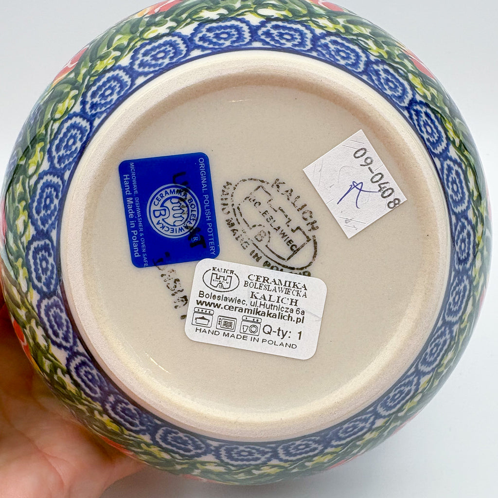 Bottom of Tulips and Bees bowl showing Kalich stamp, held in hand