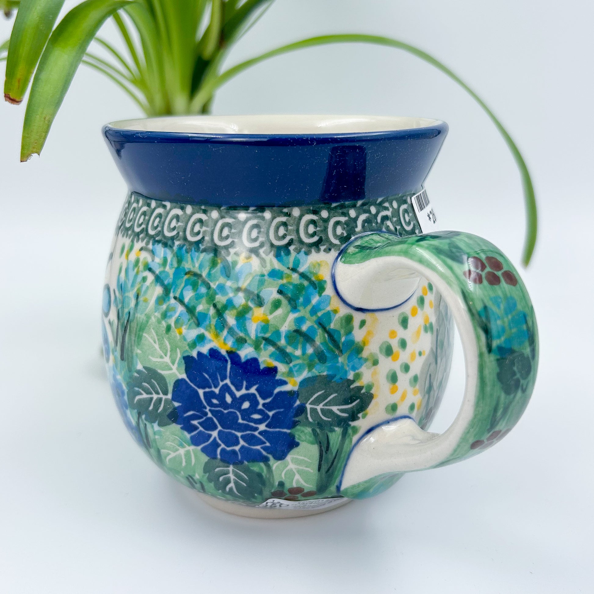 12 oz Polish Pottery floral UNIKAT bubble mug is made by talented artisans from Poland. 
Dimensions 5" x 3.66" x 3.78"
Ceramika Artystyczna Company