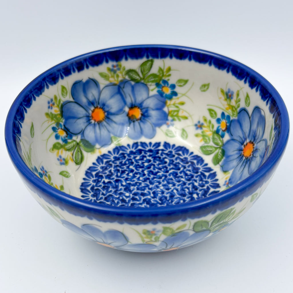 Blue Daisy bowl, top-down view showing daisy ring around blue dotted center