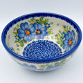 Blue Daisy bowl, top-down view showing daisy ring around blue dotted center