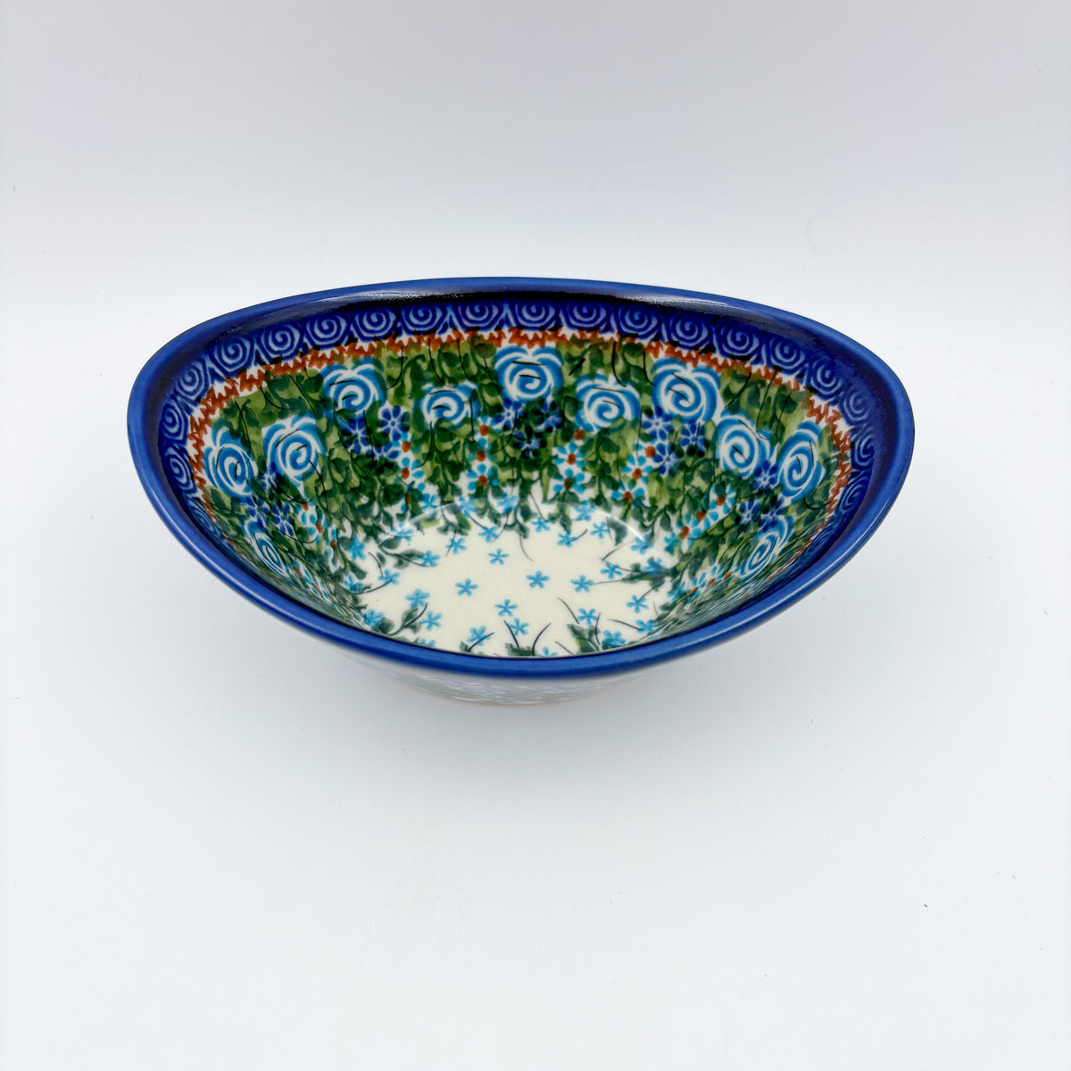 Whispering Ferns oval tub bowl, angled top-down view showing star center