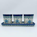 This 12” blue floral planter. This planter has 4 pieces. 3 small pots with a long 12” tray. Each small pot has drainage holes.
Dimensions 12.13" x 3.94" X 4.13'
Ceramika Artystyczna Company