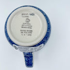 Bottom of Rhapsody in Blue bistro mug showing Unikat stamp and artist signature