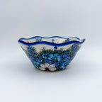 Forget Me Not Pansy wavy bowl on white background, straight-on front view