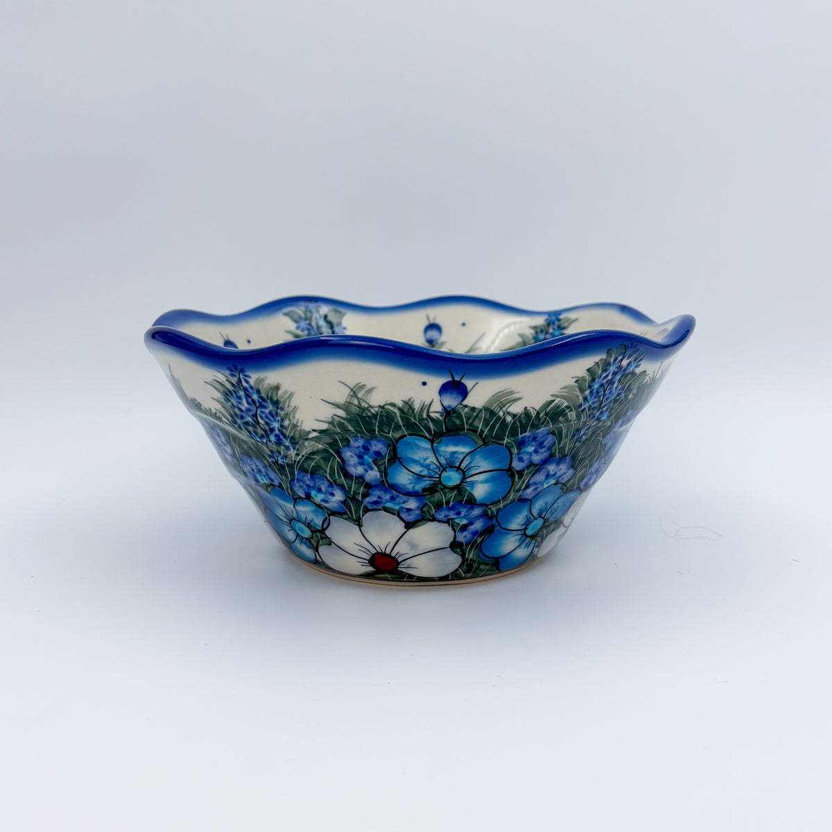 Forget Me Not Pansy wavy bowl on white background, straight-on front view