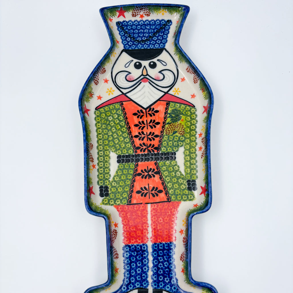 UNIKAT Green Nutcracker figural platter, straight top-down view of full platter with face and painted uniform