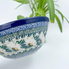 Close-up angled view of daisy pattern on Polish Daisies stacking bowl