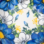 Close-up top-down view of dragonflies in center of Blue Petal Dance scalloped bowl
