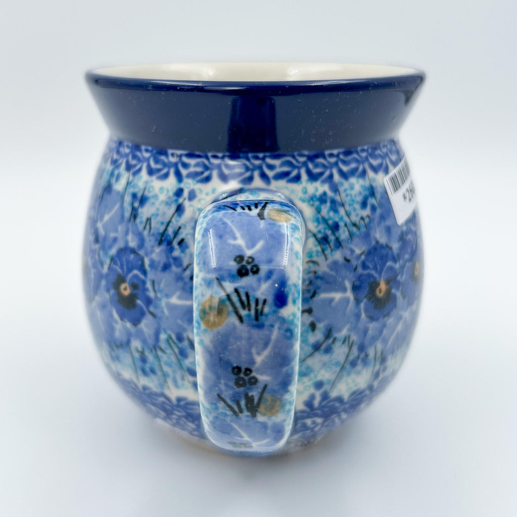 Close-up front view of Deep Winter bubble mug showing blue-on-blue pansy pattern
