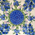 Close-up of interior dotted medallion detail on Blueberries square bowl