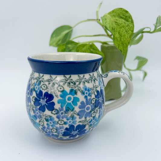 12 oz Polish Pottery UNIKAT bubble mug is made by talented artisans from Poland UNIKAT Fields of Blue Design. Ceramika Artystyczna Company