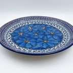 UNIKAT Cobalt Poppies plate, front view showing blue poppy cluster and scalloped border