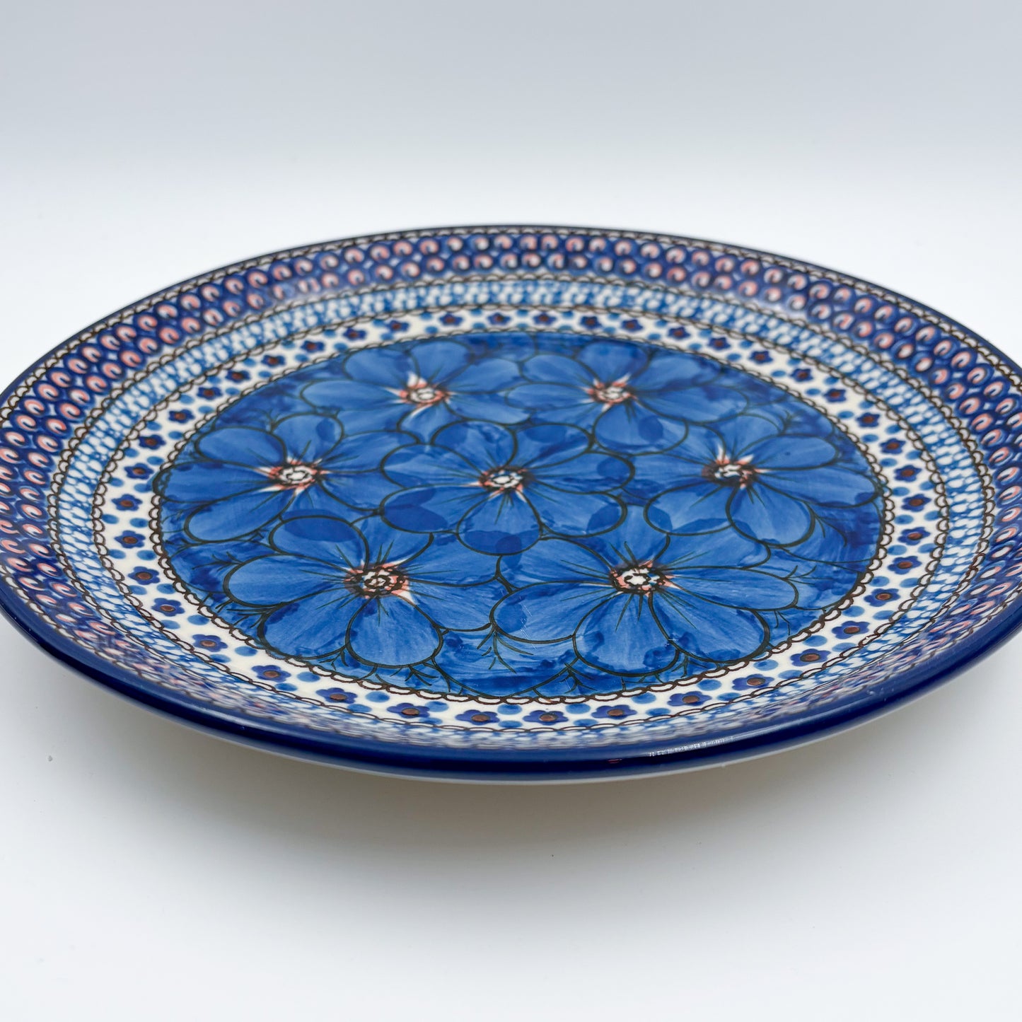 10.5” Plate.  Hand crafted Polish pottery stoneware: UNIKAT Cobalt Poppies
