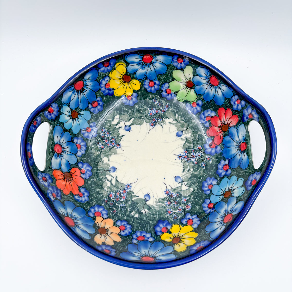 Forget Me Not Pansy handled bowl, top-down straight-on view