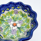 Close-up of interior floral medallion on Primrose small babka bowl, alternate angle