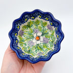 Primrose small babka bowl held in hand, top-down view