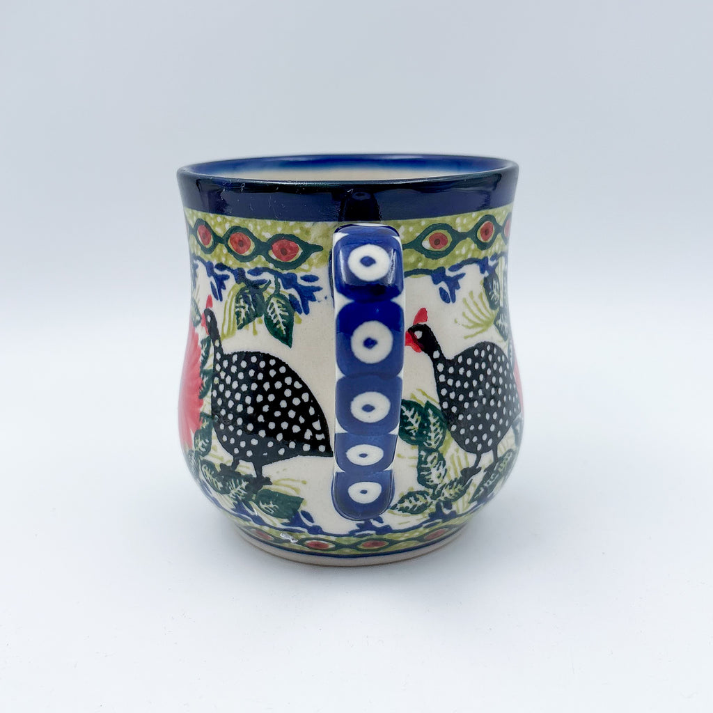Fowls in Florals bubble mug on white background, straight-on view with handle