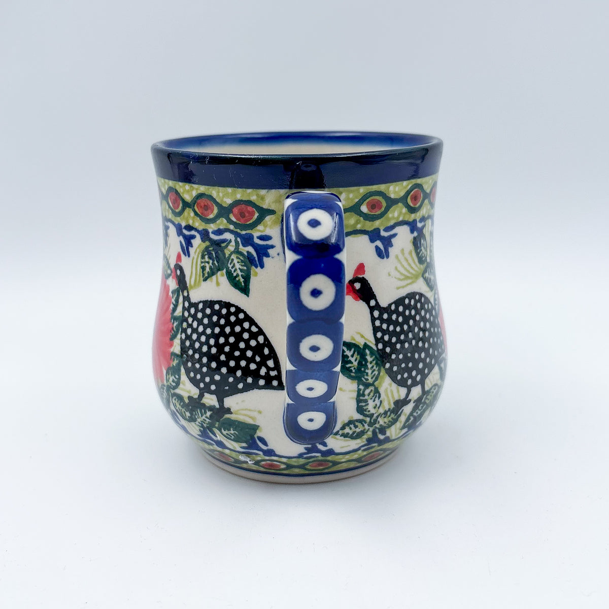 Fowls in Florals bubble mug on white background, straight-on view with handle