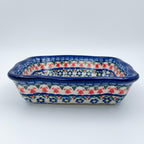 rectangular 8” baker with red poppy flowers is made by talented artisans
