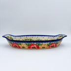 Garden Wreath boat platter, straight-on side view showing pointed handles and exterior poppy band