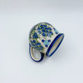 Blueberry bubble mug tipped on its side, alternate angle showing interior and pattern