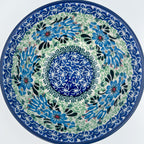 Windswept Blues bowl on white background, top-down straight-on view
