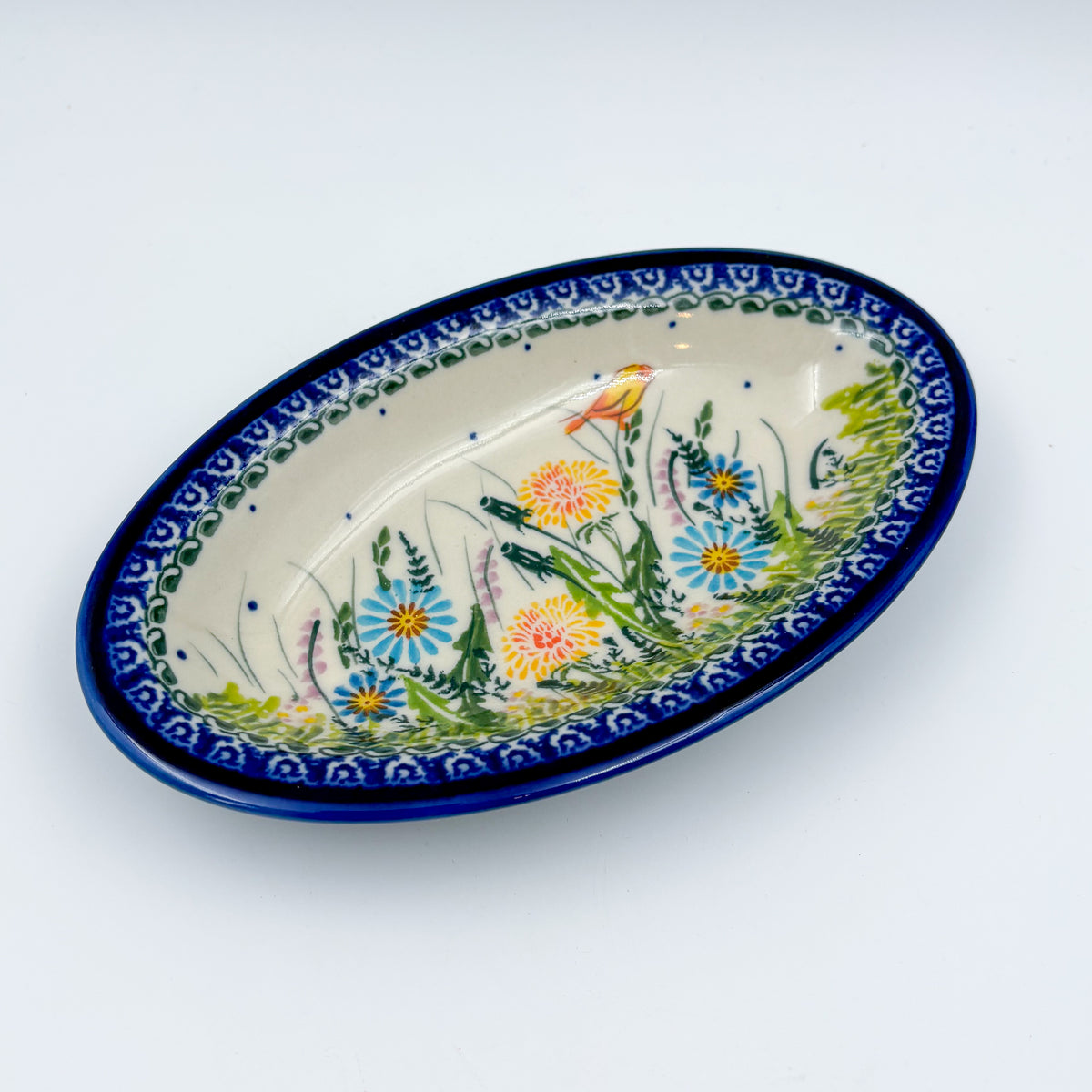 UNIKAT Songbird Garden oval Milano platter, angled top-down view of full elongated oval platter