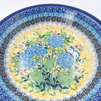 UNIKAT Blue Hydrangea pasta bowl, close-up top view of hydrangea bouquet and white butterfly