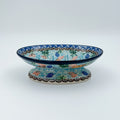 This 6” Polish pottery soap dish. UNIKAT Ocean Whisper pattern, that is hand painted with shells and aquatic life.
Ceramika Artystyczna Company
5.75" X 3.86" x 1.81"