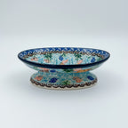 This 6” Polish pottery soap dish. UNIKAT Ocean Whisper pattern, that is hand painted with shells and aquatic life.
Ceramika Artystyczna Company
5.75" X 3.86" x 1.81"