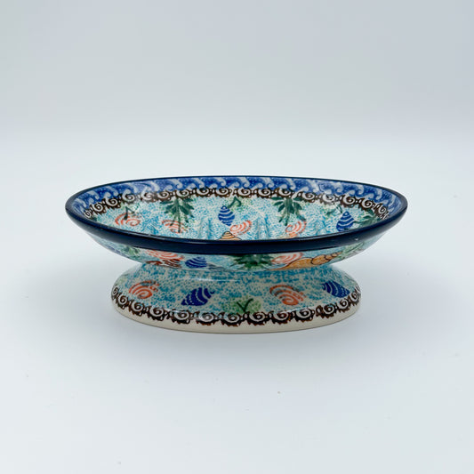This 6” Polish pottery soap dish. UNIKAT Ocean Whisper pattern, that is hand painted with shells and aquatic life.
Ceramika Artystyczna Company
5.75" X 3.86" x 1.81"