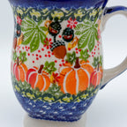 Close-up of acorns and pumpkins on Hedgehog and Pumpkins tulip mug