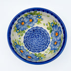 Blue Daisy bowl, top-down close-up view of blue daisy ring around blue dotted center