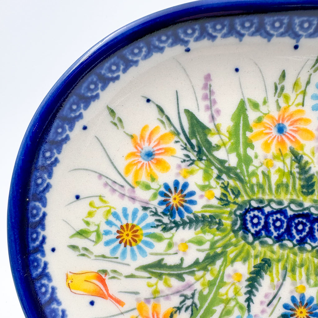 UNIKAT Wildflower Meadow oval platter, angled corner view of wildflower spray and rim