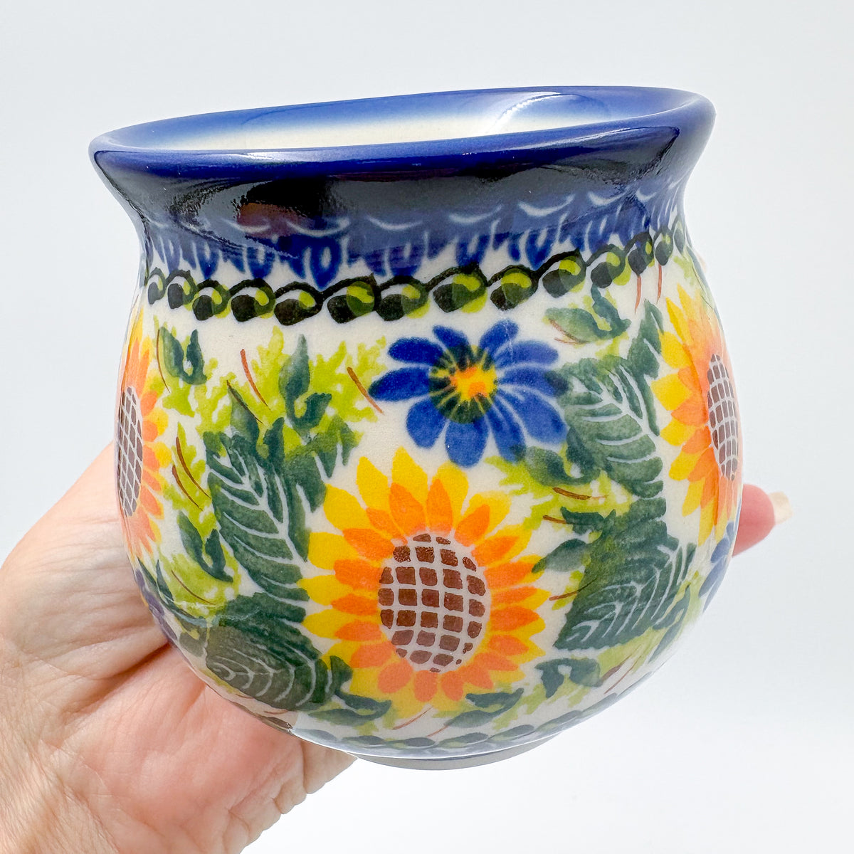 Fall Sunflower bubble mug held in hand, close-up front view