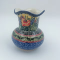 This 4” floral vase is a handmade by talented Polish artisans. This is a Polish UNIKAT signature vase.Dimensions 4.33 X 3.35 X 3.35
Ceramika Artystyczna Company