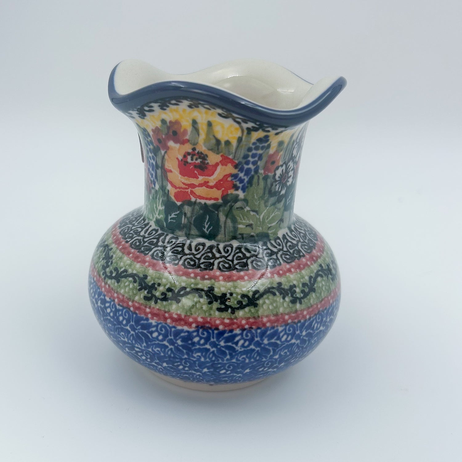 This 4” floral vase is a handmade by talented Polish artisans. This is a Polish UNIKAT signature vase.Dimensions 4.33 X 3.35 X 3.35
Ceramika Artystyczna Company