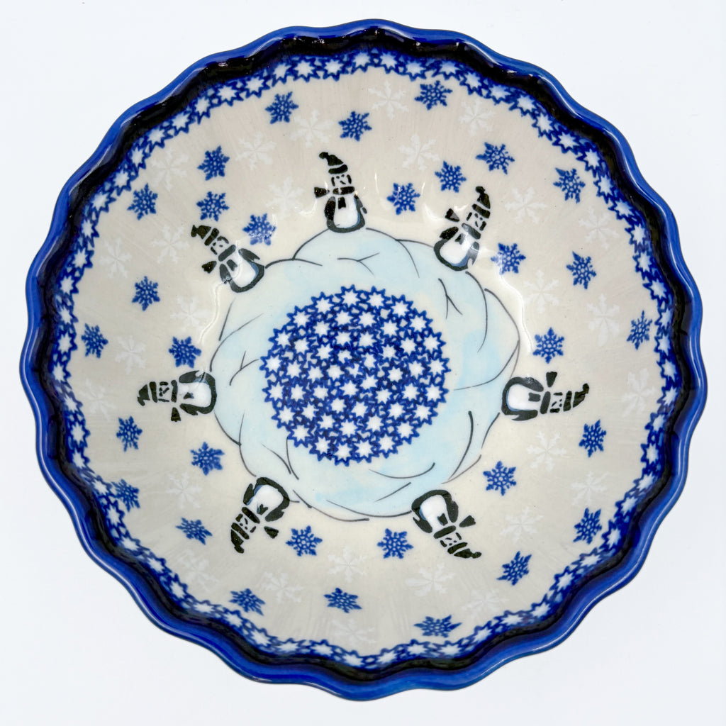 Snowman Penguins Design shell bowl, top-down view of snowman figures and blue starburst center