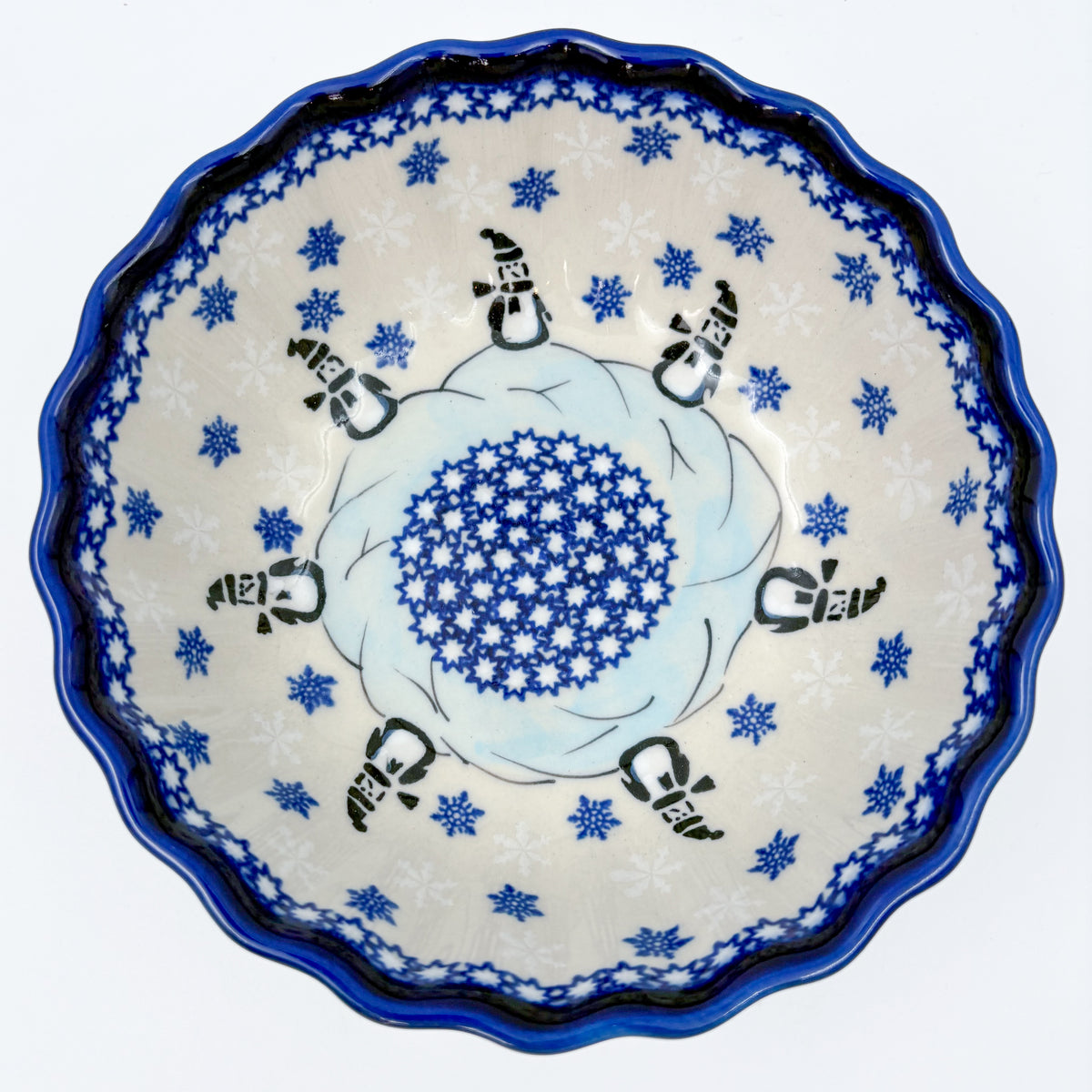 Snowman Penguins Design shell bowl, top-down view of snowman figures and blue starburst center