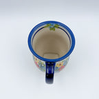 Top-down view into Garden Party tulip mug showing cream interior and handle