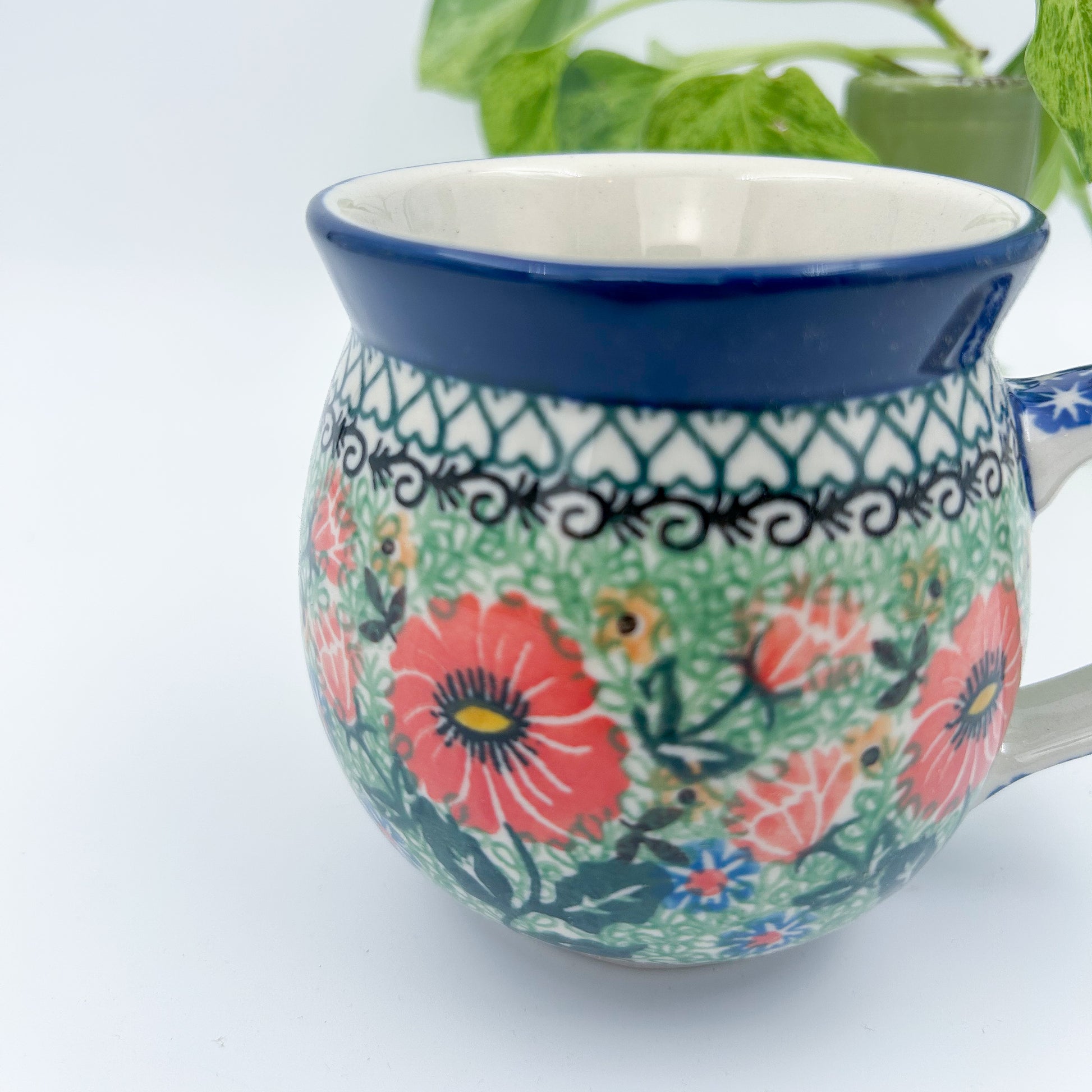 12 oz Polish Pottery bubble mug is made by talented artisans from Poland UNIKAT Poppy Parade Design. Ceramika Artystyczna Company