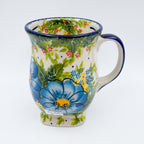 Blue Poppy Dance tulip mug, angled front view showing floral pattern