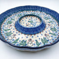 Dancing Snowman chip and dip platter, angled front view showing scalloped rim, center dip bowl, and snowmen with pine trees
