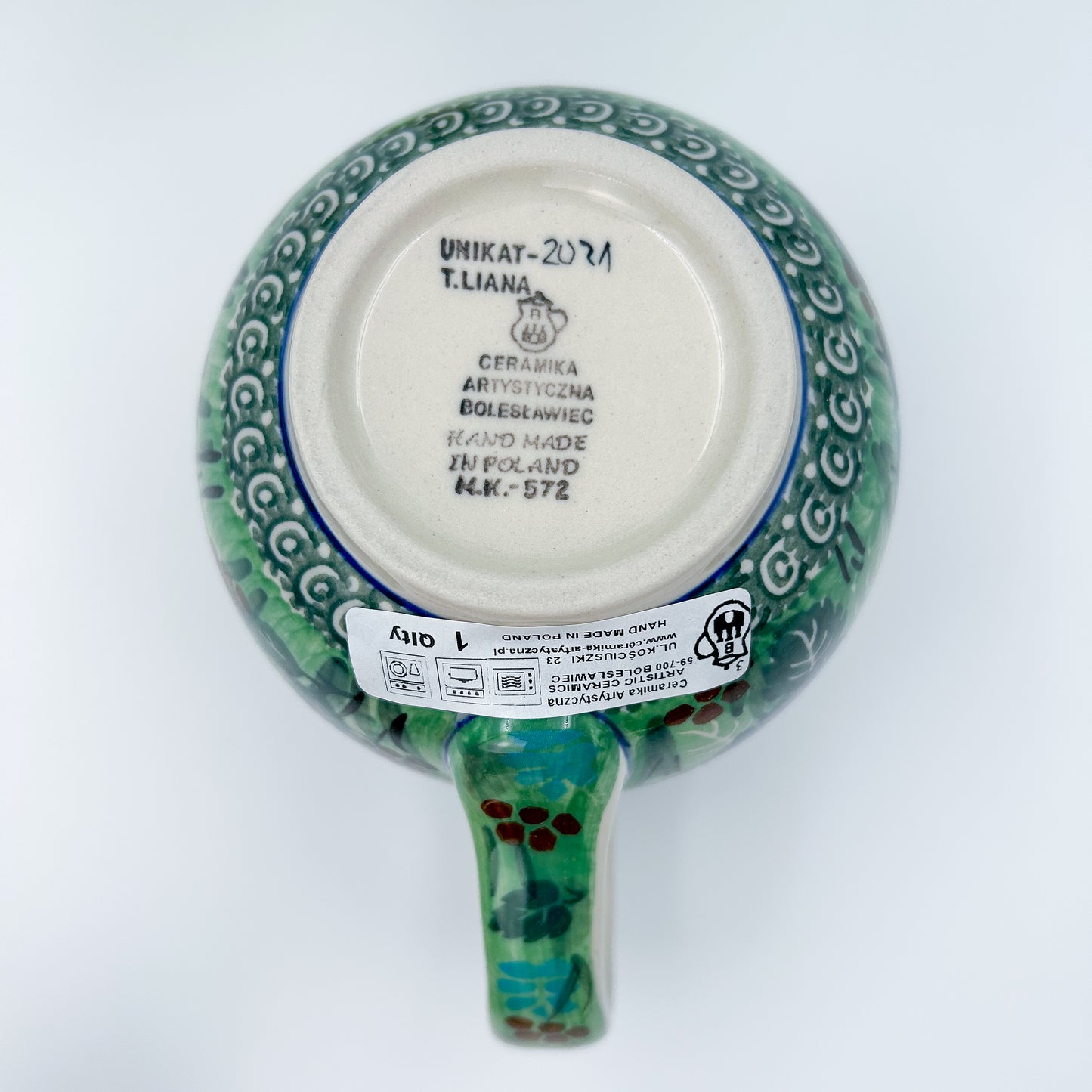 12 oz Polish Pottery floral UNIKAT bubble mug is made by talented artisans from Poland. 
Dimensions 5" x 3.66" x 3.78"
Ceramika Artystyczna Company