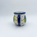 Blue Pansy bubble mug, front view with handle facing forward